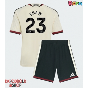 Manchester United Luke Shaw #23 Tredje trøje Børn 2026-27 Kort ærmer (+ korte bukser)